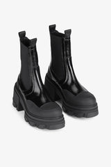 GANNI us Cleated Heeled Mid Chelsea Boots in Black Naplack