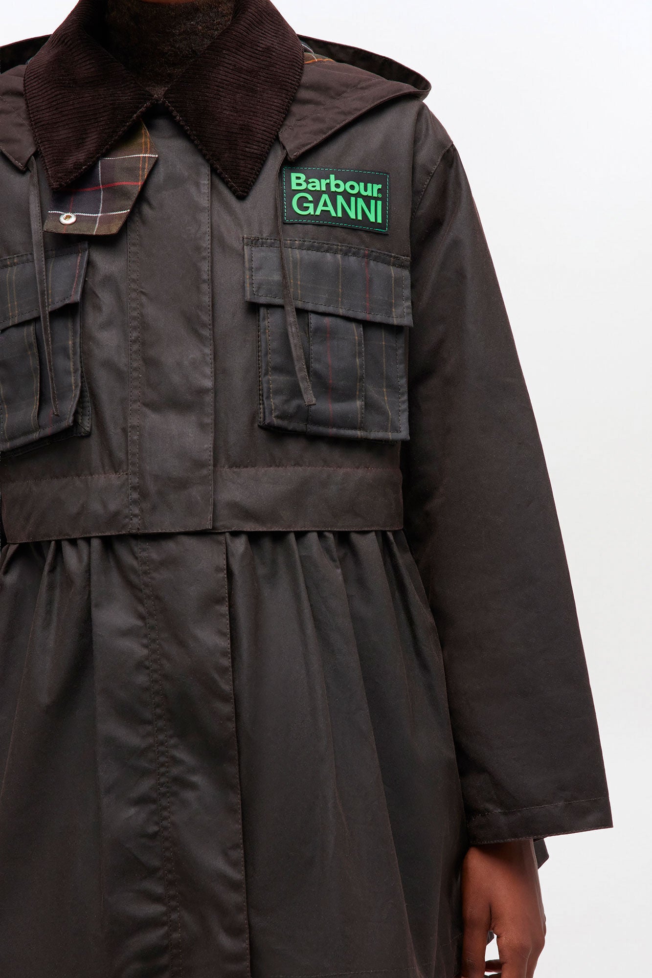 GANNI New Peplum Wax Jacket in Green